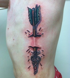 Cruel arrow tattoo