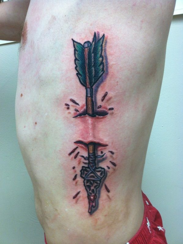 Cruel arrow tattoo