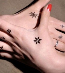 Cute fingers star tattoo