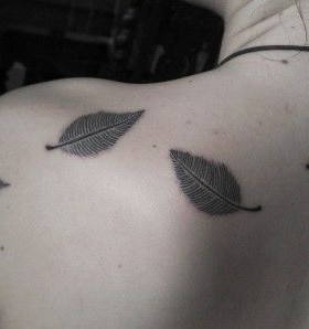 Delicate leaf tattoo