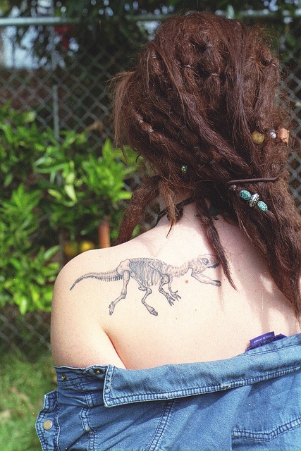 Dinosaur bones tattoo
