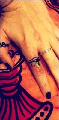 Eye on finger Egypt style tattoo