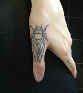 Finger insect tattoo