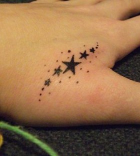 Fingers star tattoo