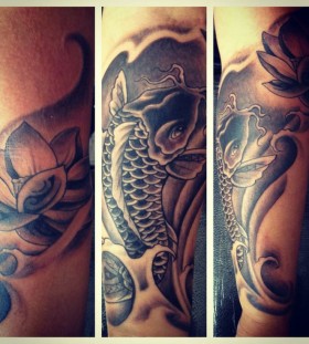 Fish and lotus flower tattoo