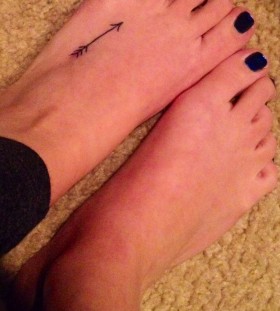 Foot arrow tattoo