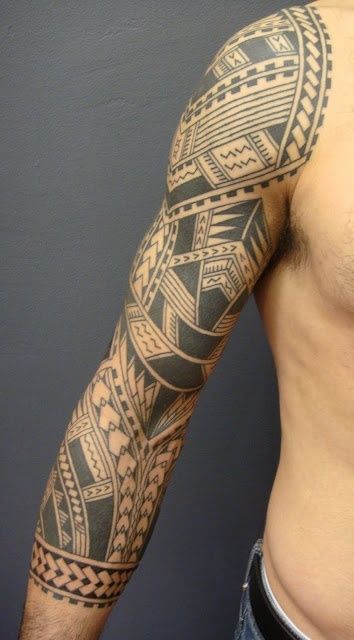 Full arm tribal tattoo