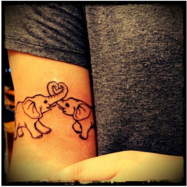 Funny elephants girl tattoo