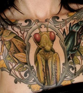 Green insect tattoo