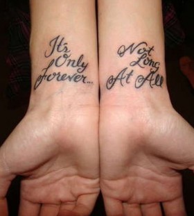 Hand quote tattoo