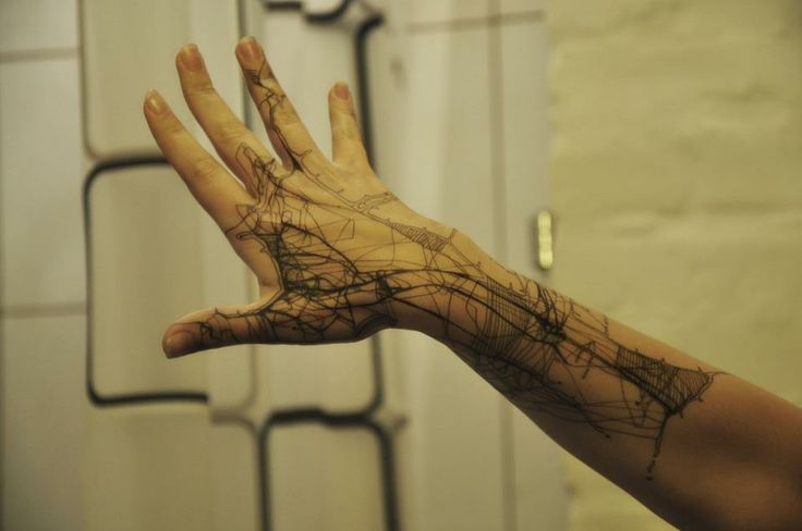 Hand tattoo by Grisha Maslov