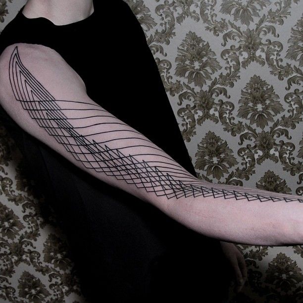 Hands tattoo by Chaim Machlev