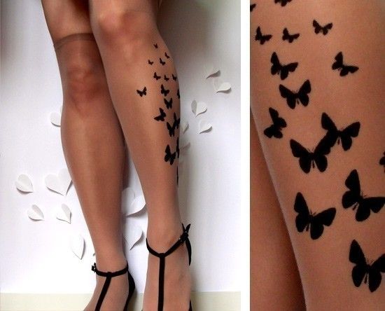 Legs butterfly tattoo
