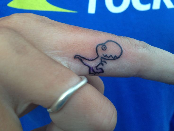 Lovely finger dinosaur tattoo