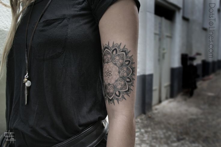 Lovely flowers tattoo by Chaim Machlev