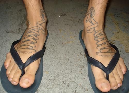 Lovely man foot tattoo
