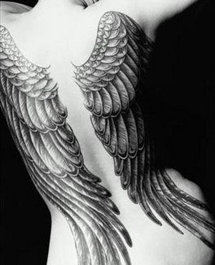 Lovely woman wings tattoo