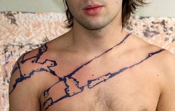 Men purple tattoo by Grisha Maslov