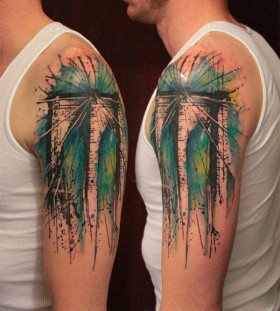 Men shoulder watercolor tattoo