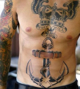Men's anchor and military style tattoos
