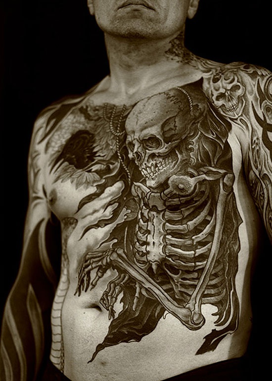 Men’s black and white skull tattoo