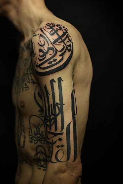 Men’s black ornaments Egypt style tattoo