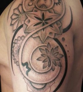 Ornaments and lotus flower tattoo