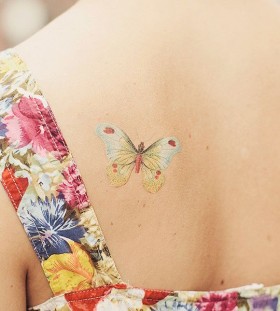 Pretty back butterfly tattoo