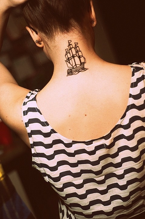Pretty girl’s ship tattoo
