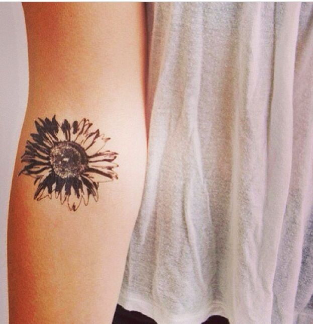 Pretty hand sunflower tattoo