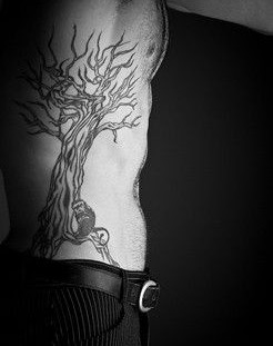 Pretty men tree tattoo
