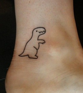 Pretty smiling dinosaur tattoo
