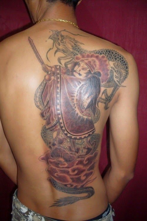 Red and black asian tattoo