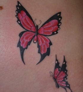 Red and black butterfly tattoo