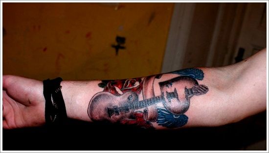 Red and black guitar tattoo