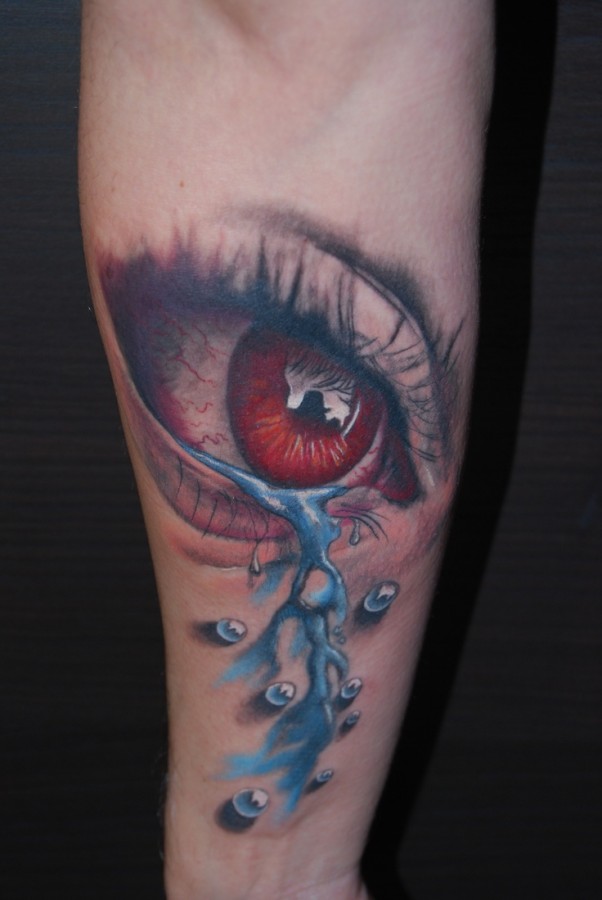 Red eye tattoo