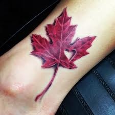 Red heart and leaf tattoo
