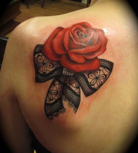 Red rose and bow lace tattoo