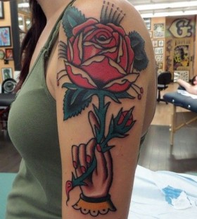 Red rose tattoo by Dustin Barnhart