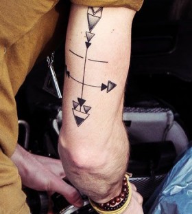 Simple men's hand arrow tattoo
