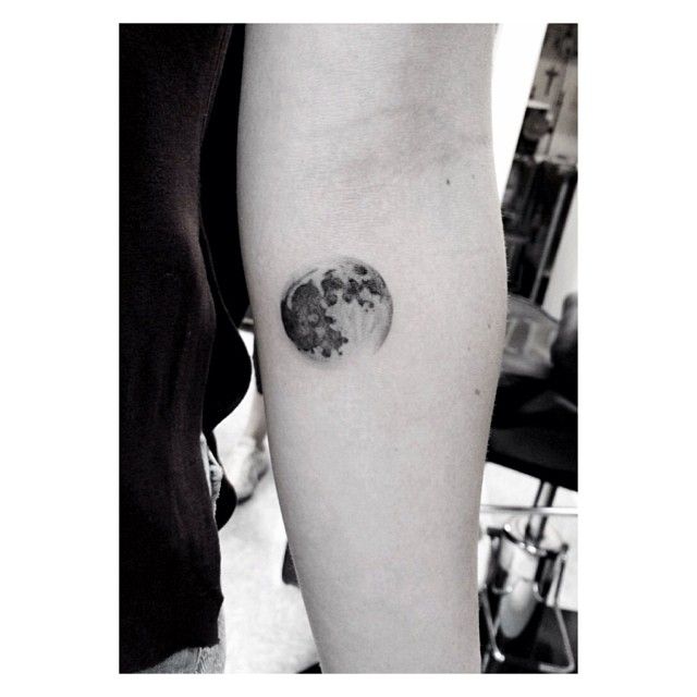 Simple owal moon tattoo