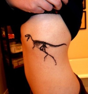 Skeleton of dinosaur tattoo