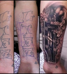 Skull and guitar tattoo