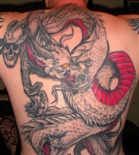 Skull and red dragon tattoo