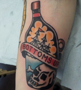 Skull and ship tattoo by Dustin Barnhart