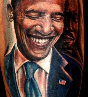 Smiling Obama american president tattoo