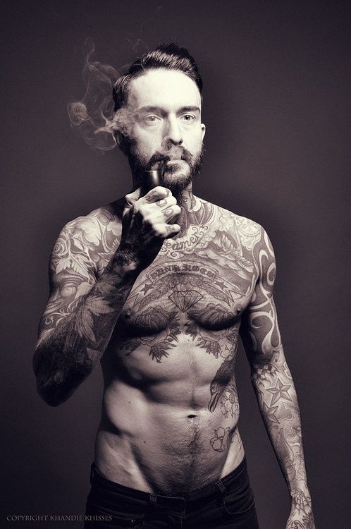 Smoking men tattoo on chest