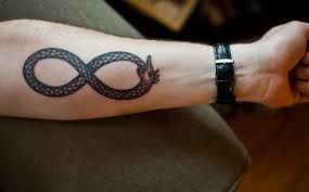 Snake infinity tattoo