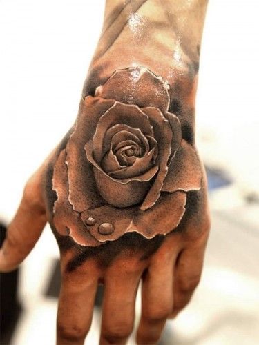 Water and rose realistic tattoo