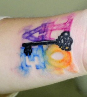 Watercolor key painting tattoo